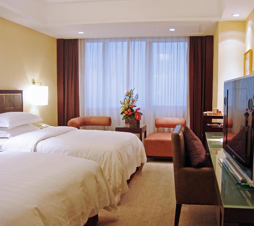 Guangzhou New Century Hotel Quarto foto