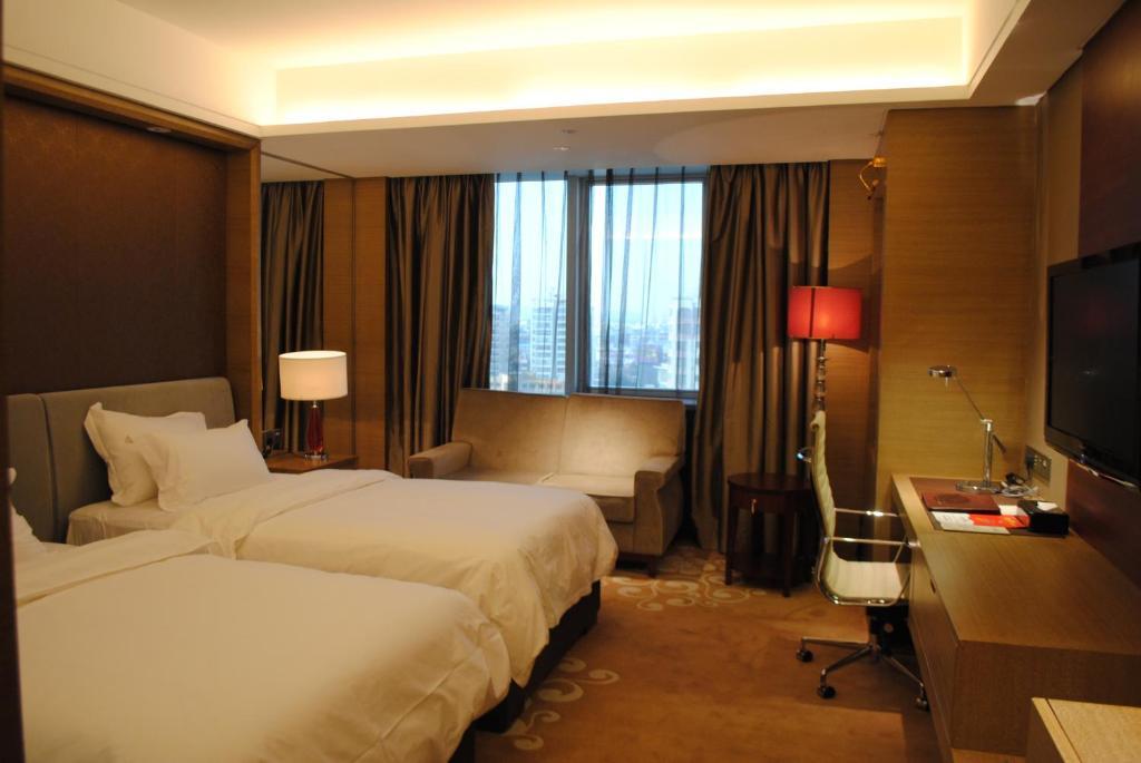 Guangzhou New Century Hotel Quarto foto